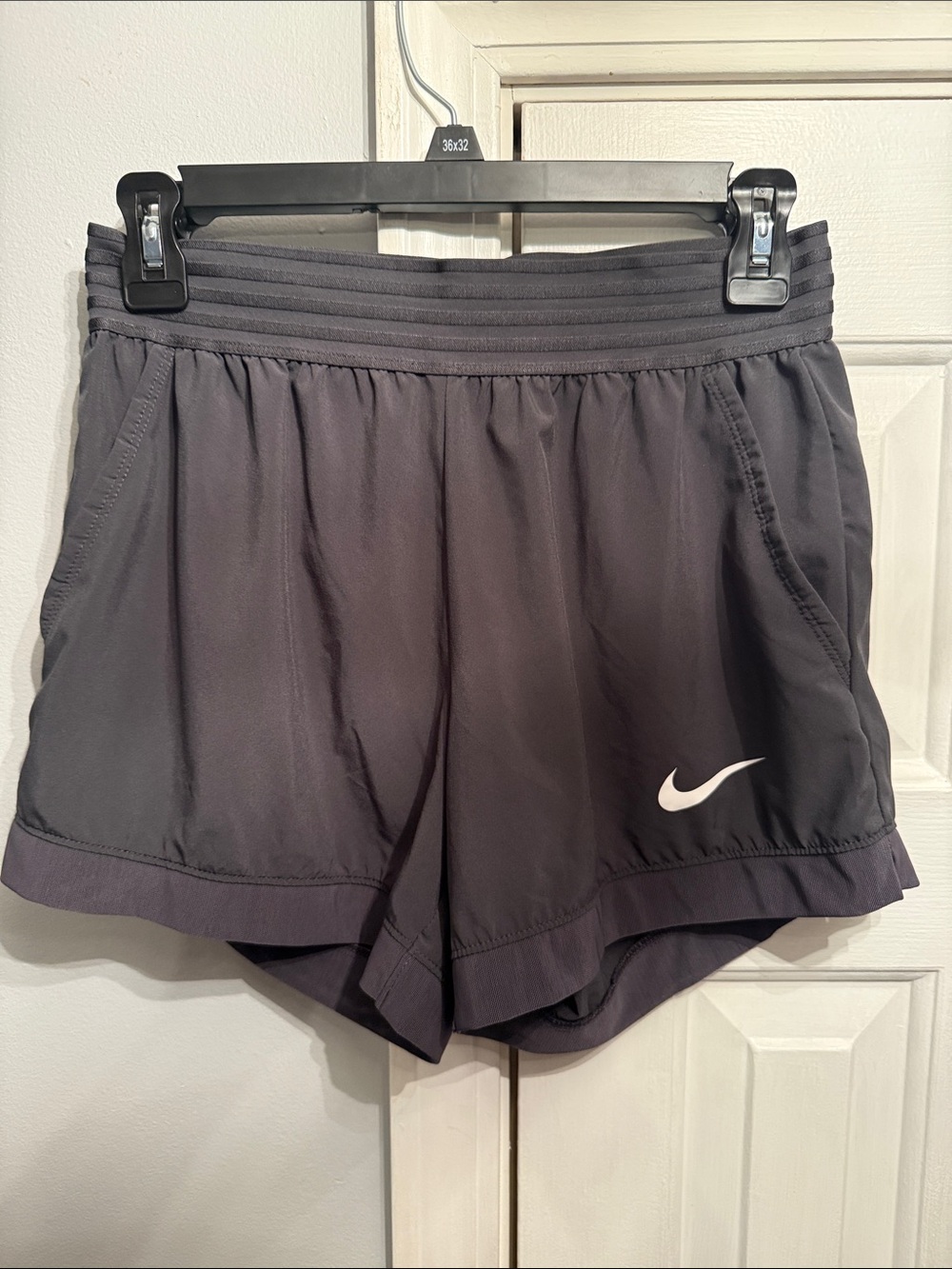 Nike Women's Dark Gray Athletic Shorts with White Swoosh